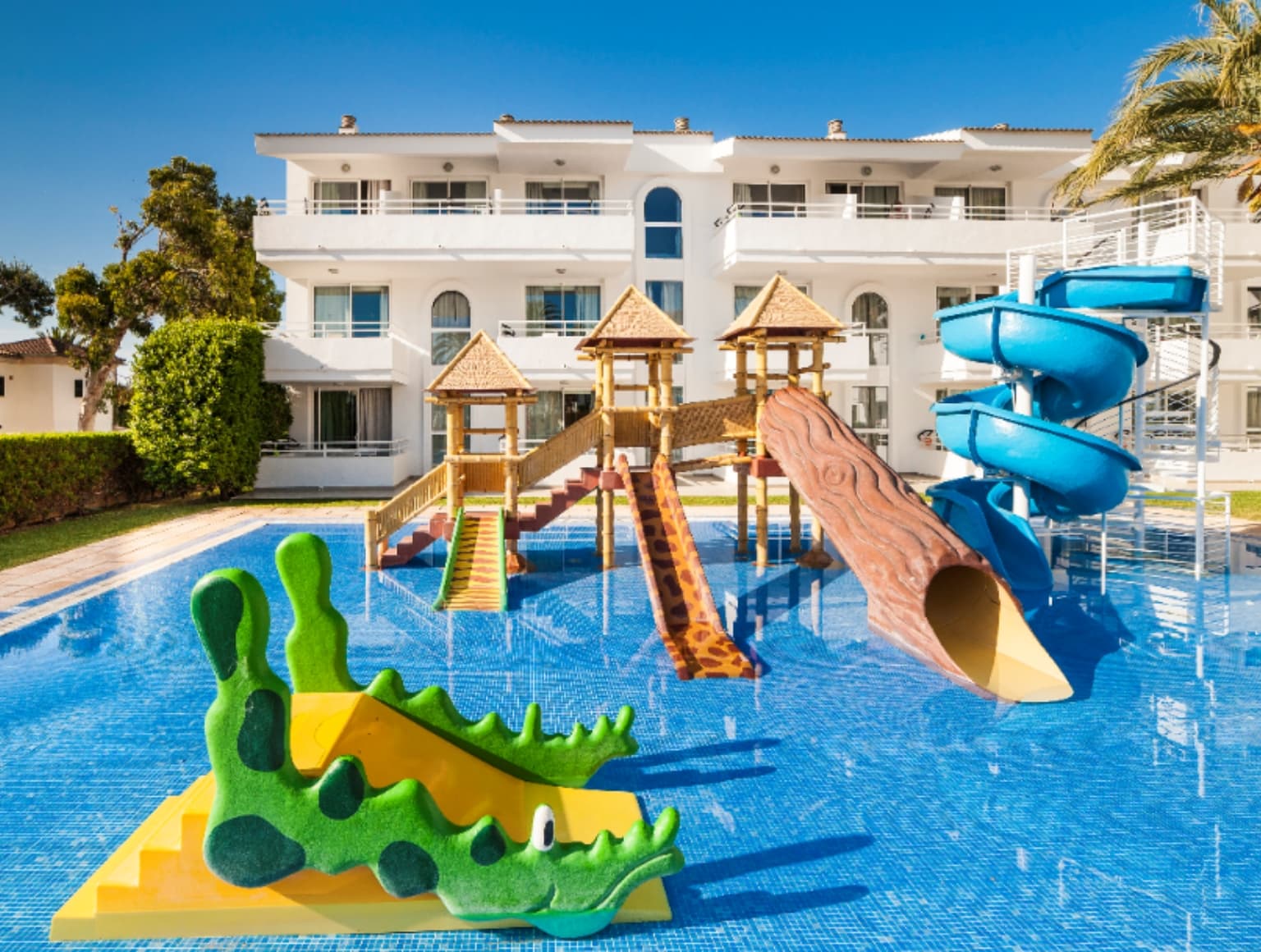 Detail view of the hotel's swimming pool with children's slides.